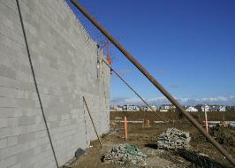 Concrete Masonry Unit Construction, Wall Failure Caused by Wind